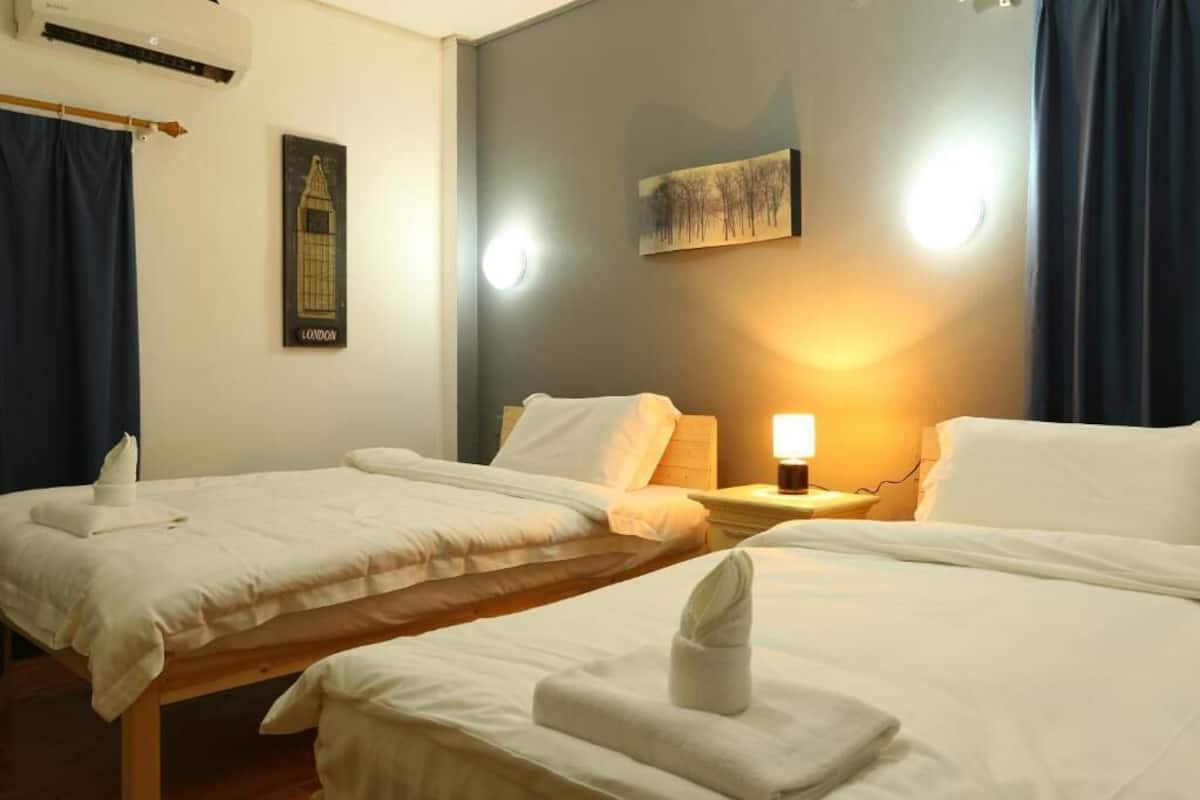 Habitación estándar con 1 cama matrimonial o 2 individuales | Ropa de cama de alta calidad, escritorio y wifi gratis