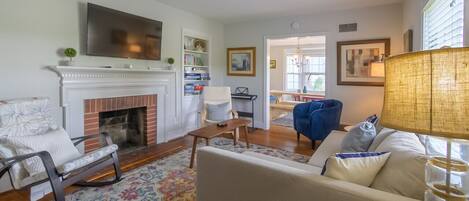 Smart TV, fireplace, foosball, music library