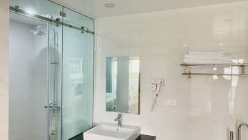Deluxe Double Room Single Use | Bathroom | Free toiletries, hair dryer, slippers
