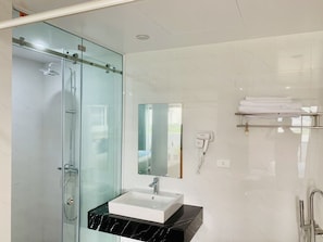 Deluxe Double Room Single Use | Bathroom | Free toiletries, hair dryer, slippers