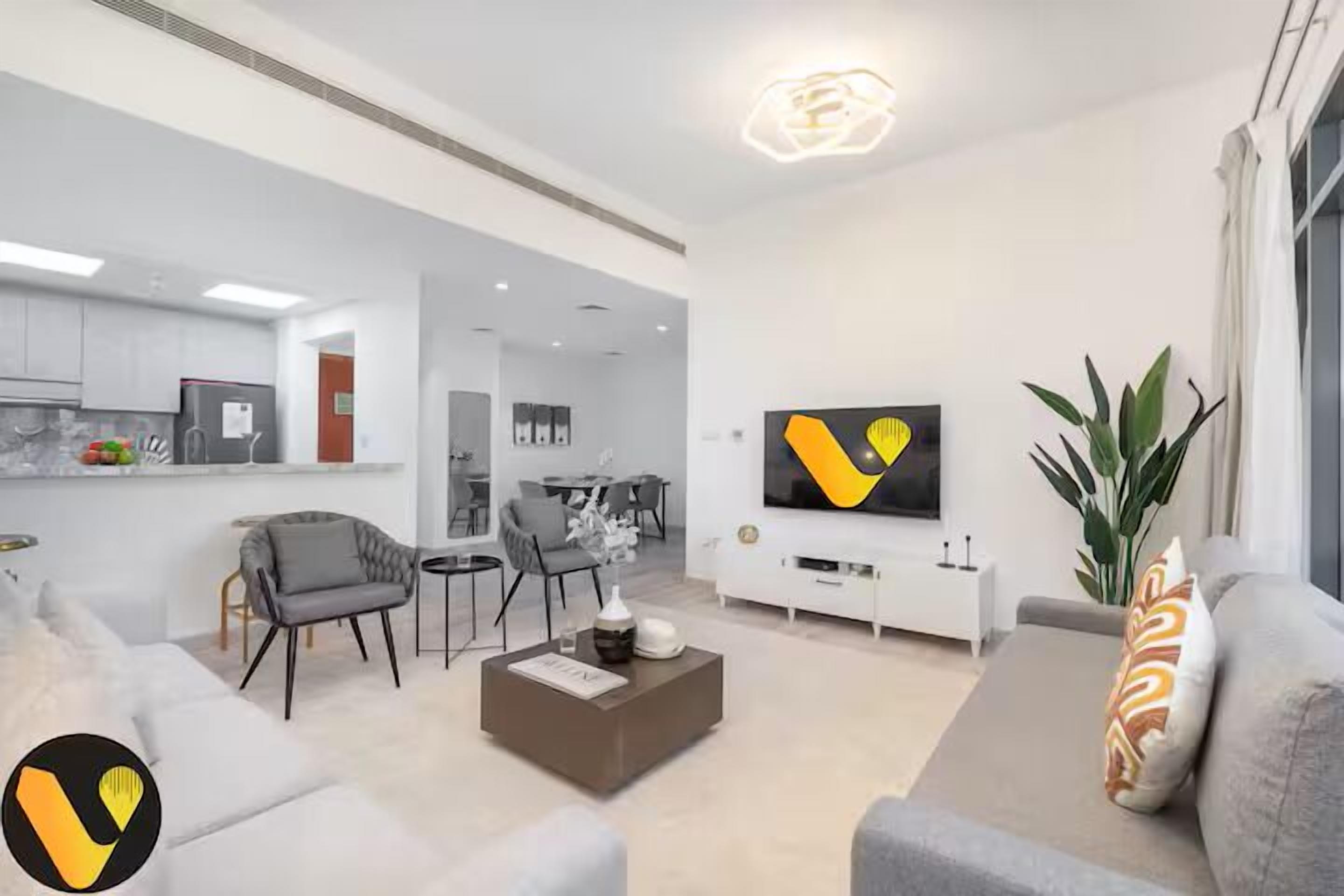 Family Apartment | Living area | 65-inch Smart TV with cable channels