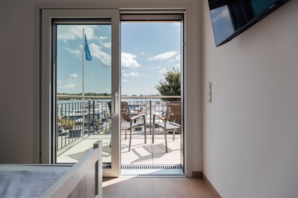 Schlafzimmer mit Balkon