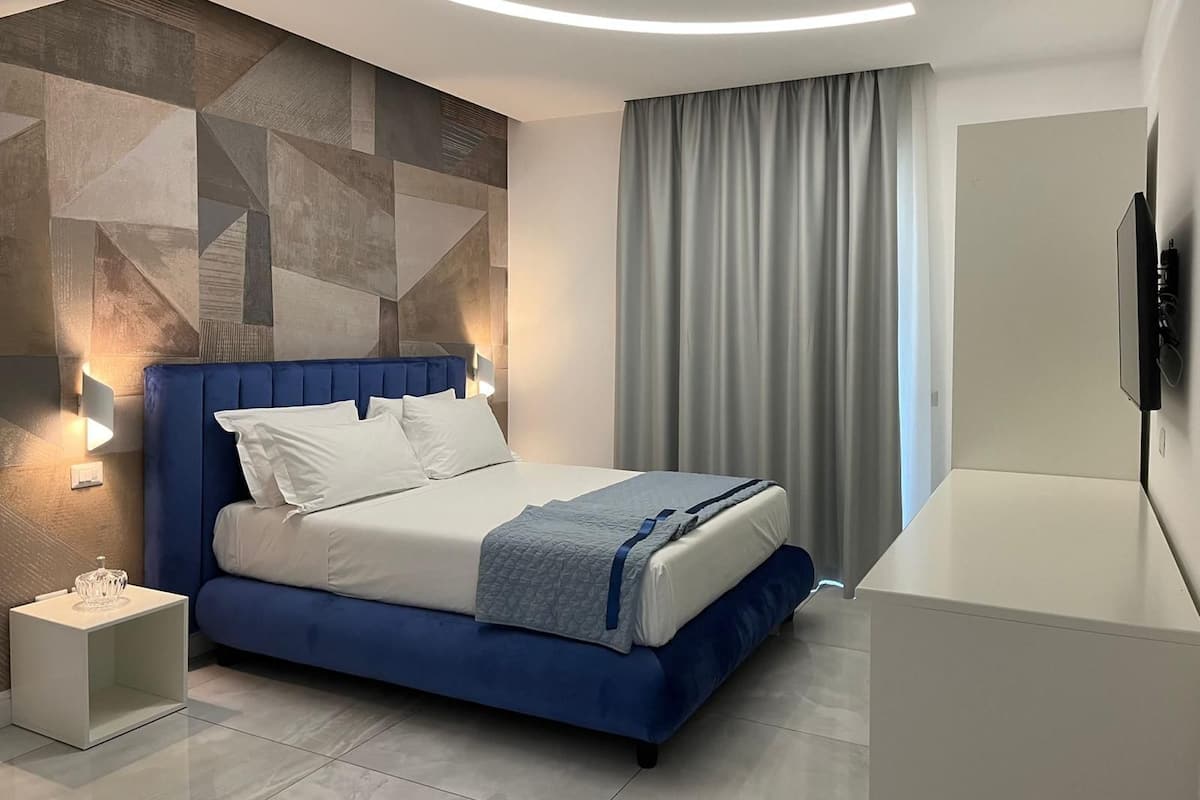 Familie suite | 1 slaapkamer, lakens van Egyptisch katoen, luxe beddengoed, een minibar