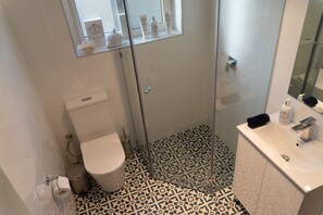 Shower, hair dryer, towels, soap - Luxury Couples Retreat Beach Front Apt with Ocean View Balcony (Glenelg North)