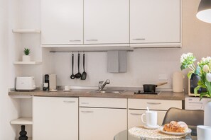 Fridge, microwave, stovetop, electric kettle
