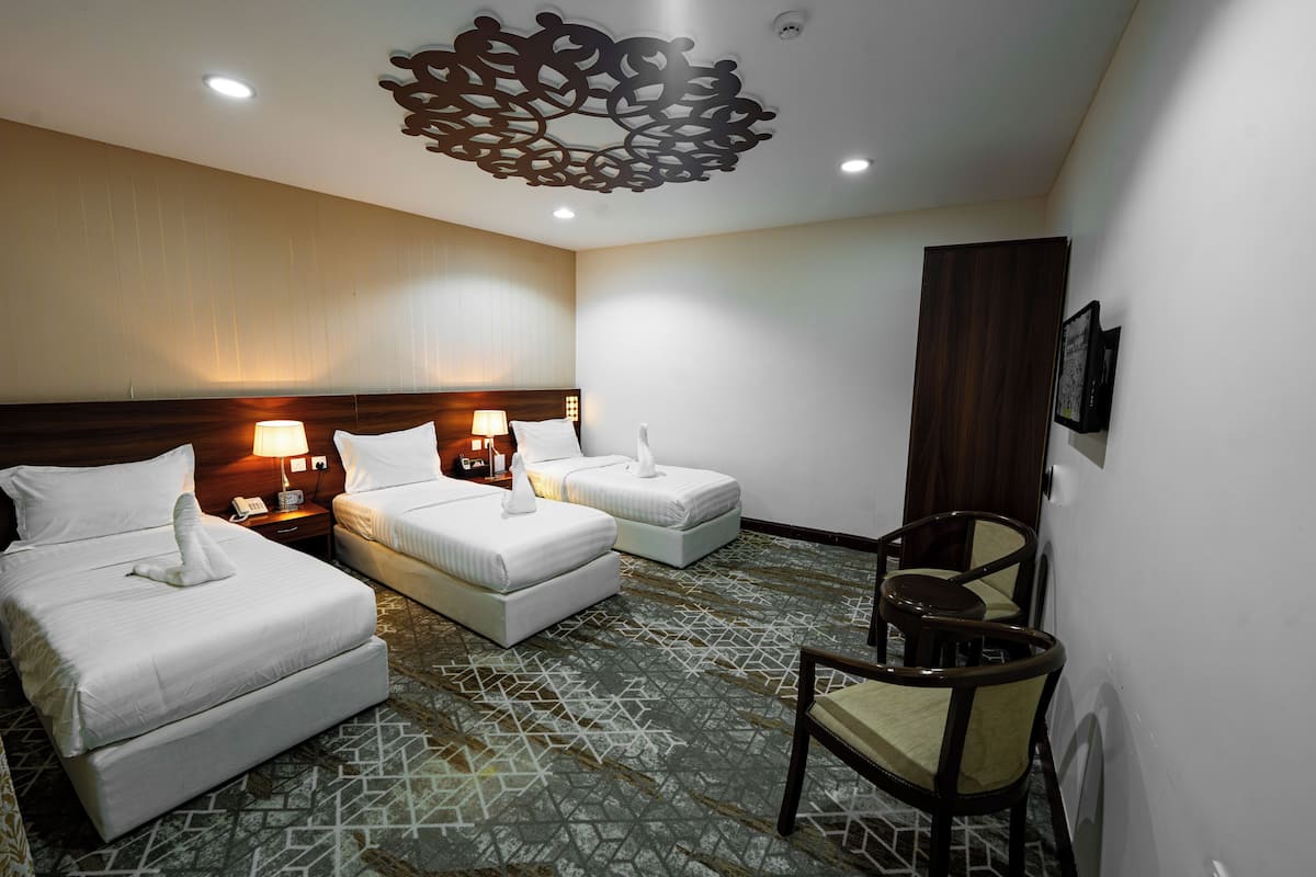 Economy Triple Room | Iron/ironing board, free WiFi