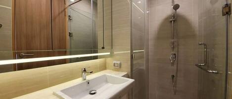 Shower, hair dryer, towels, soap