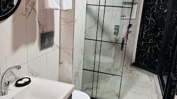 Hair dryer, bathrobes, slippers, towels