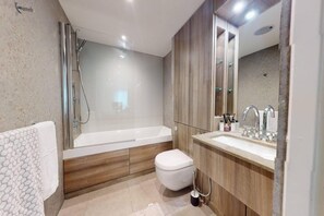 Apartment, 1 Queen Bed with Sofa bed | Bathroom | Deep soaking tub, hair dryer, towels