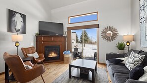 Smart TV, fireplace, foosball, books