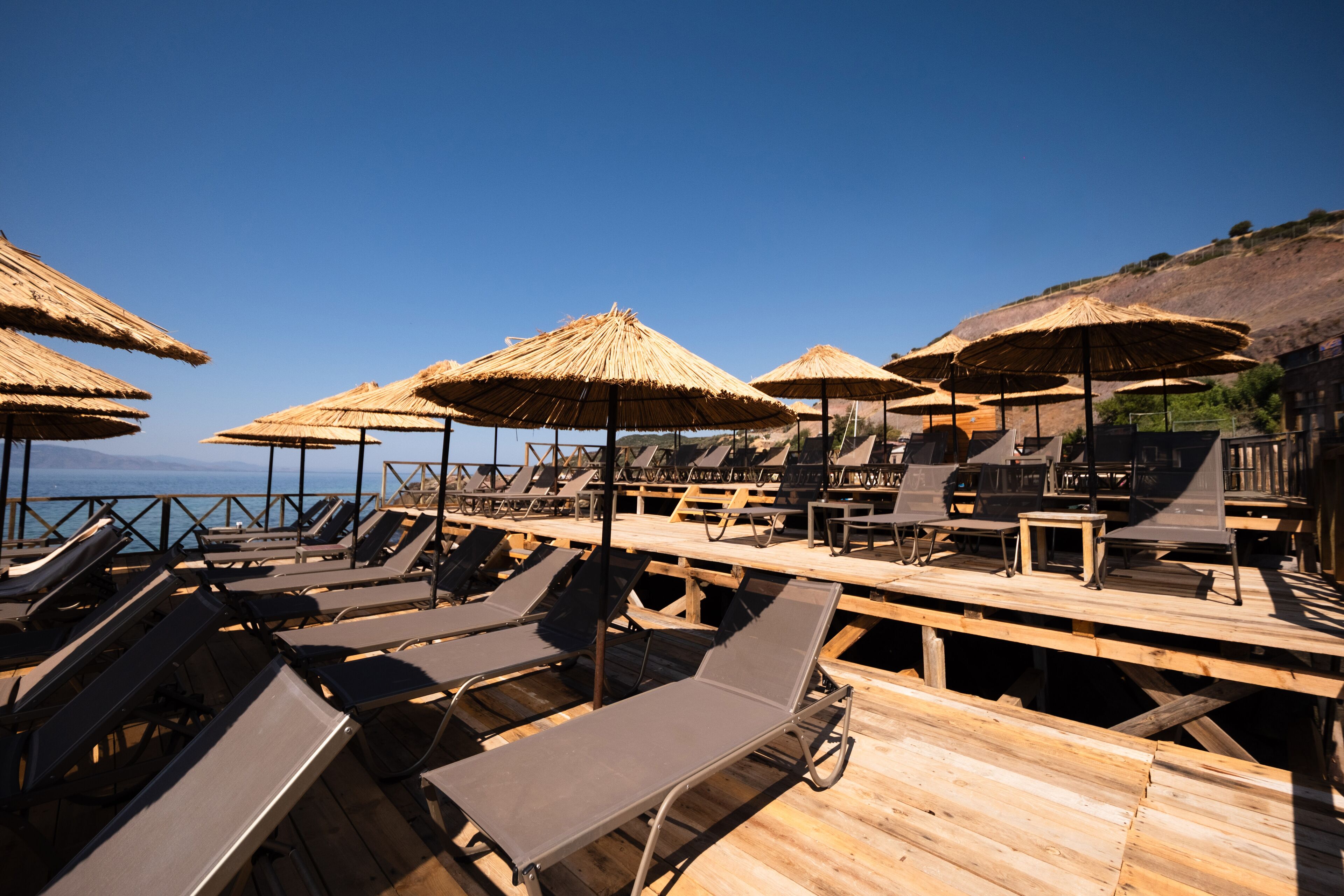 Plage privée, sable noir