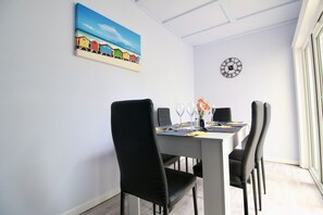 Dining - The Courtyard - a house that sleeps 8 guests in 3 bedrooms (Seaford)