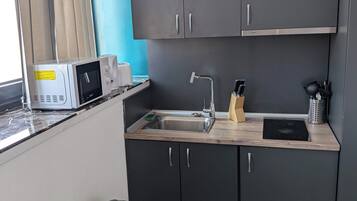 Fridge, microwave, stovetop, electric kettle