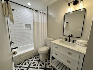 Hair dryer, towels, soap, shampoo