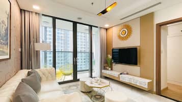 Apartment, 2 Bedrooms, Balcony, City View | Laptop workspace, blackout curtains, soundproofing, iron/ironing board