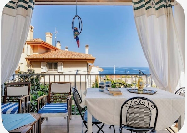 Outdoor dining - IN THE PARADISE OF SARDINIA NICE APARTMENT WITH SEA VIEW (Cala Gonone)