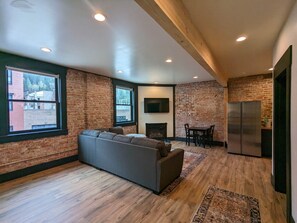 TV, fireplace - The Linden Lofts at Albertini’s- Downtown Luxury Loft #4 (Wallace)
