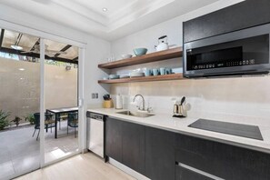 Fridge, microwave, oven, stovetop - Stylish Ground floor Condo  walking to Town (Tamarindo)