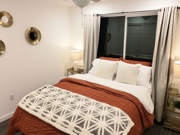 1 bedroom, desk, iron/ironing board, travel crib