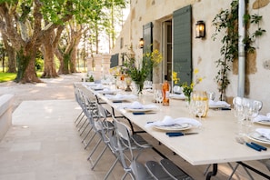 Dining table in front of kitchen - seats 22