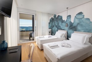 2 chambres, coffres-forts dans les chambres, fer et planche à repasser