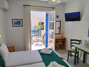 Studio, 2 Twin Beds, Private Bathroom | In-room safe, free WiFi, bed sheets - Nostos Studios (Naxos)