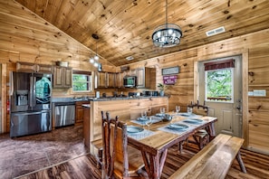 Fridge, microwave, oven, stovetop - Family Retreat - HotTub! Theater! FirePit! Wifi! Grill! Jacuzzi in both bedrooms (Pigeon Forge)