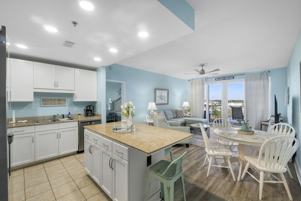 Fully Stocked Kitchen with Lake Views, Light Show Views and Island Bar Seating