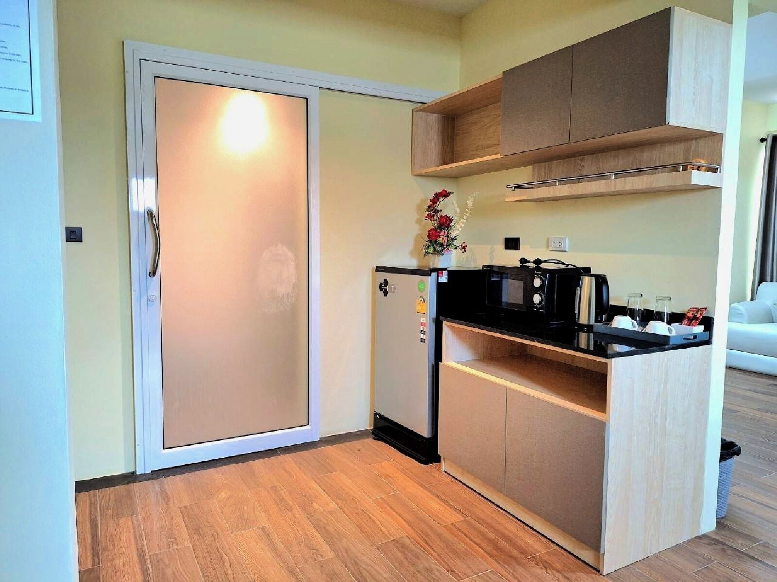 Exclusive Studio Suite | Private kitchen | Fridge, electric kettle, dining tables