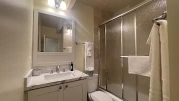 Hair dryer, towels, soap, shampoo