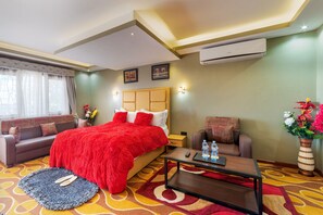 Executive Suite | Premium bedding, memory-foam beds, free minibar items, desk - Afro Park Hotel and Health Club (Kampala)