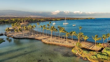 On the beach, sun loungers, beach towels