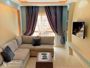 Smart TV, fireplace - A Wonderful Apartment in a compound in 6 October Gardens (Giza Governorate)
