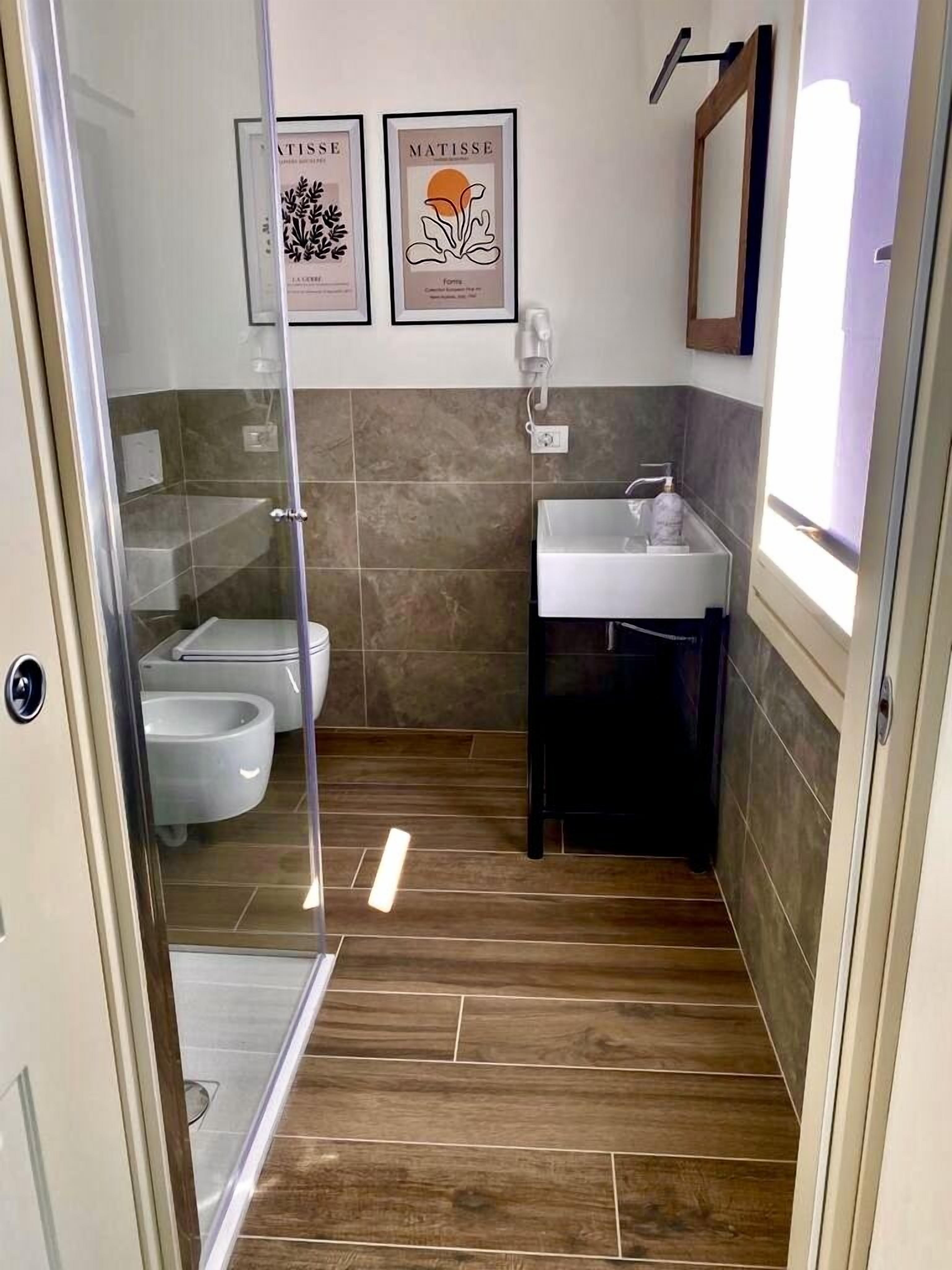 Hair dryer, bidet, towels, soap
