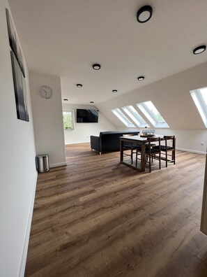 Apartamento Deluxe | Zona de estar