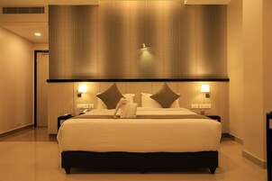 Down comforters, memory foam beds, desk, laptop workspace