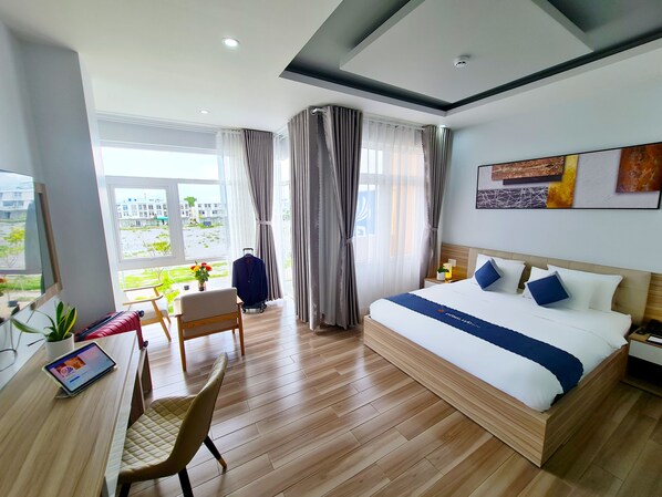 Habitación doble Deluxe | Escritorio, wifi gratis y ropa de cama 