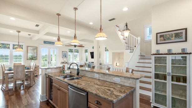 A spacious kitchen with a large island, wooden cabinets, and pendant lighting. - Gulf Views-Resort Style Community! (Santa Rosa Beach)