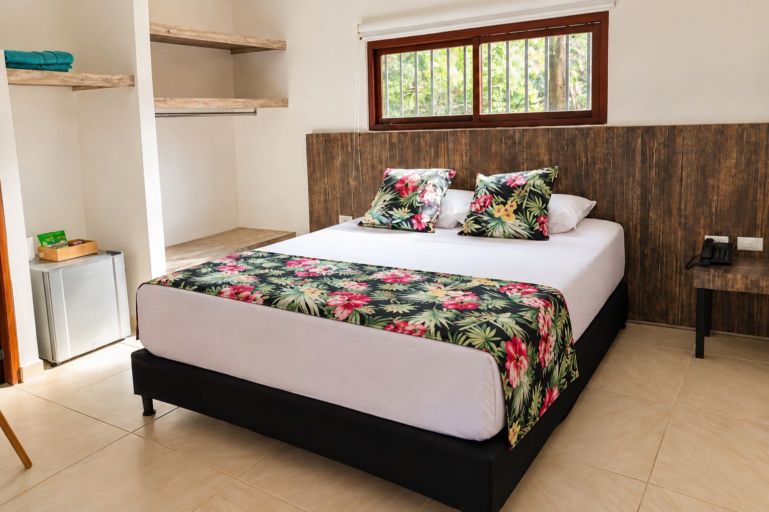 Un dormitorio con una cama, cabecera de madera, ventana, mesita de noche y un armario pequeño.