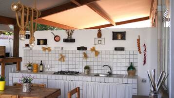 Comfort Villa | Private kitchen | Full-sized fridge, oven, stovetop, espresso maker