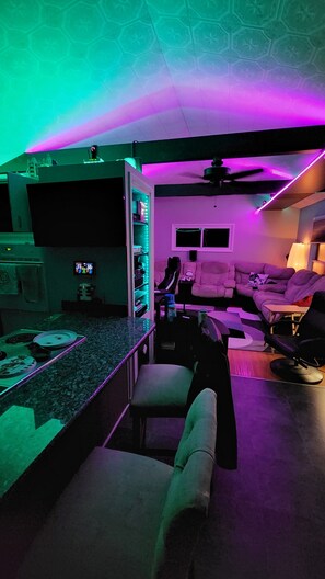 Smart TV, video games, DVD player, foosball