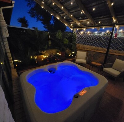 Serene Spa hot tub Sanctuary with patio for the whole family