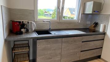 Mikrovågsugn, ugn, spishäll och diskmaskin