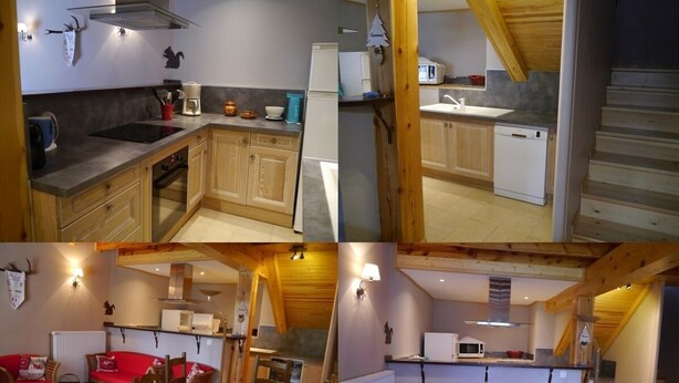 A kitchen with wooden cabinets, a stove, and a microwave. There is a dining area with a table and chairs. The room has a red sofa and a red carpet. - Maison DE Village (Formiguères)