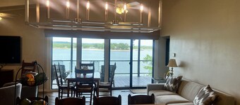 Large, shady patio with deep-water two-story dock with sunset views. Sleeps 8