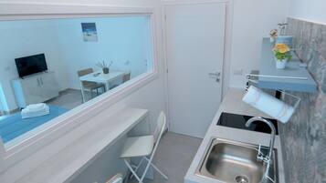 Condo, Non Smoking, Sea View | Private kitchen | Full-size fridge, oven, stovetop, cookware/dishes/utensils