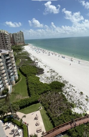 On the beach, sun-loungers, beach towels