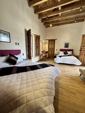 Premium bedding, down duvets, pillow-top beds, individually furnished