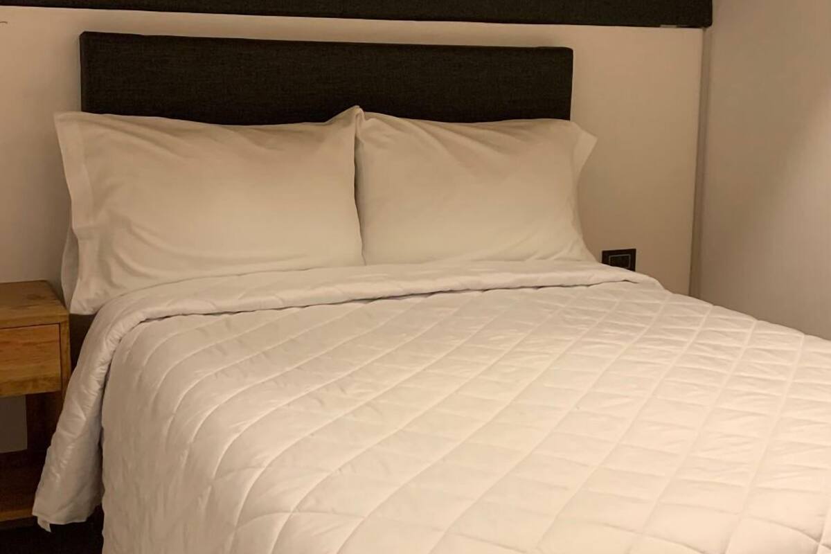 Premium bedding, down duvets, pillow-top beds, individually furnished