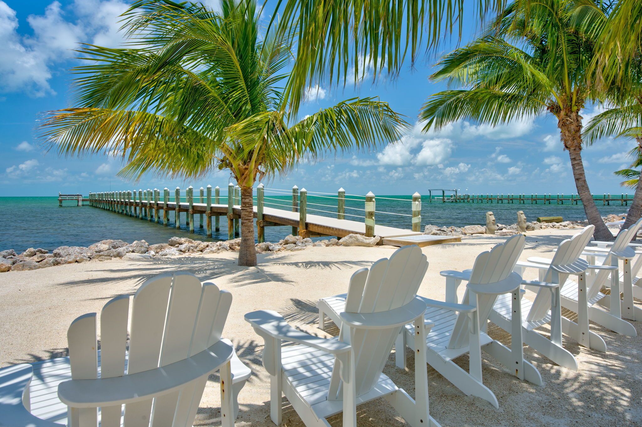 On the beach, sun-loungers, beach towels
